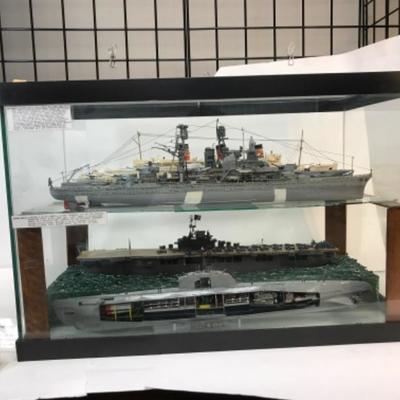 5 Completed ship models inside homemade display case