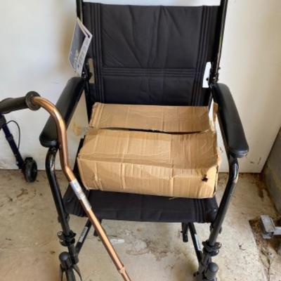 Lot #248 New Transport Chair And attachments 