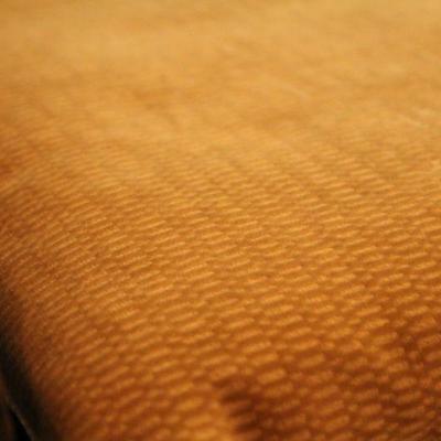 Lot 13: Pier 1â„¢ Woven Wicker Bench w/ Padded Cushion (underside of cushion has stain)