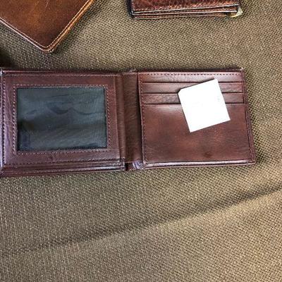 #25 (4) Group of 4 wallets: 1 New 3 used 