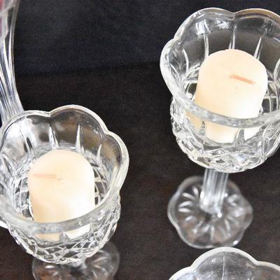 D Lot 49: Glass Candlesticks and Holders