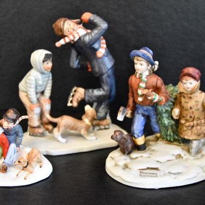 D Lot 62: Trio of Norman Rockwell Winter Figurines