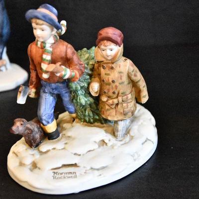D Lot 62: Trio of Norman Rockwell Winter Figurines