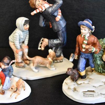 D Lot 62: Trio of Norman Rockwell Winter Figurines