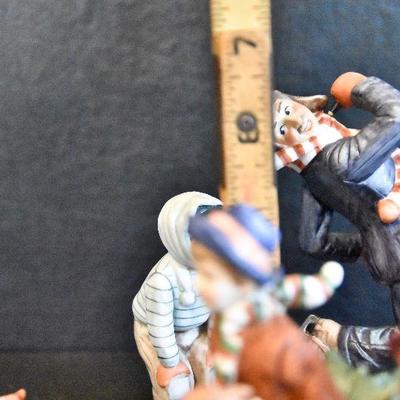 D Lot 62: Trio of Norman Rockwell Winter Figurines