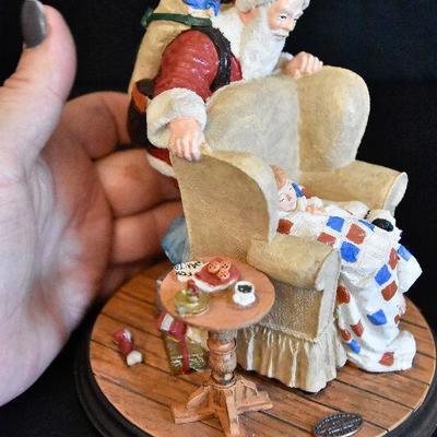 D Lot 63: Pair of Norman Rockwell Santa Figurines