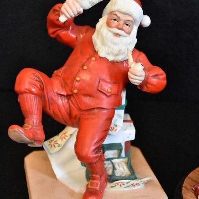D Lot 63: Pair of Norman Rockwell Santa Figurines