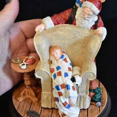 D Lot 63: Pair of Norman Rockwell Santa Figurines