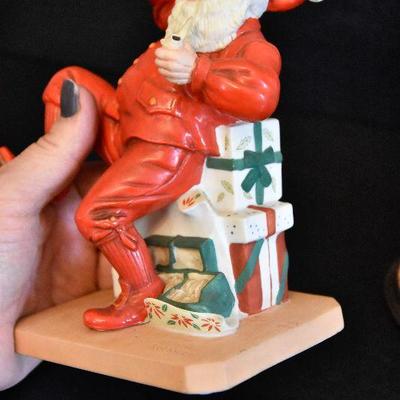D Lot 63: Pair of Norman Rockwell Santa Figurines