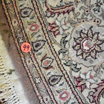 L Lot 99: Round Rug