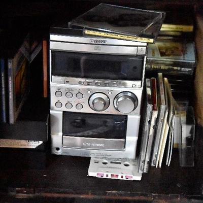 L Lot 101: Vintage Victrola Stereo Cabinet with Contents