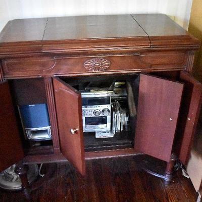 L Lot 101: Vintage Victrola Stereo Cabinet with Contents