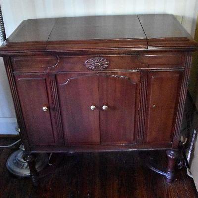 L Lot 101: Vintage Victrola Stereo Cabinet with Contents