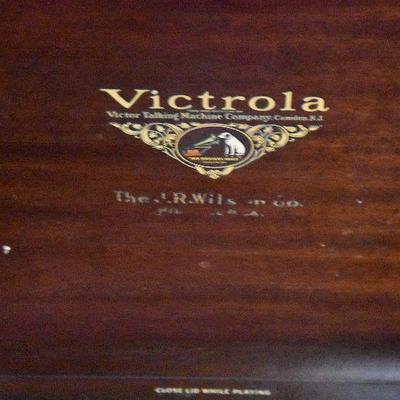 L Lot 101: Vintage Victrola Stereo Cabinet with Contents