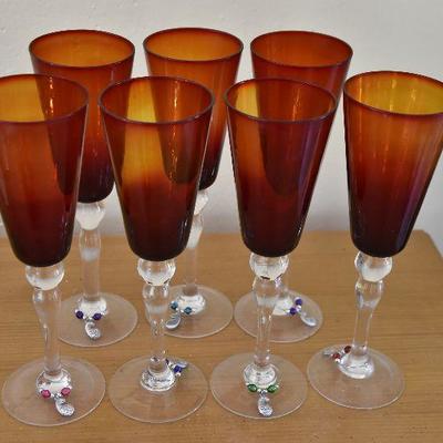 P Lot 132: Red/Orange Wine Glasses with Identifier Charms