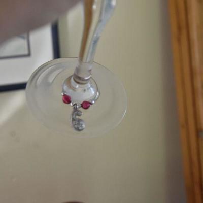 P Lot 132: Red/Orange Wine Glasses with Identifier Charms