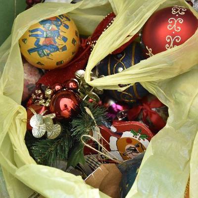 P Lot 204: Bin of Christmas Orniments and Trim