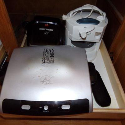 LOT 25  TWO GEORGE FOREMAN'S & LIDS OFF