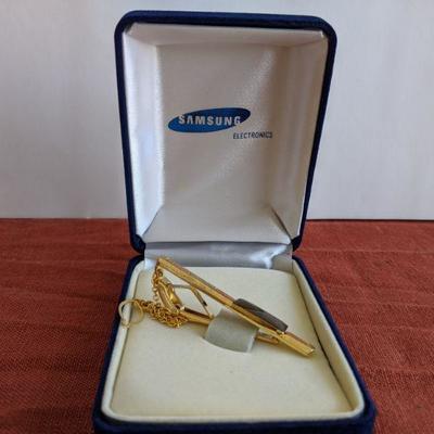 Tie Clip with Embedded Decorative Microchip