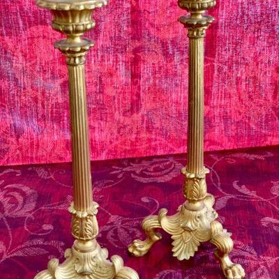 LOT 28  ANTIQUE PAIR OF PAW FOOT METAL CANDLE STICKS 