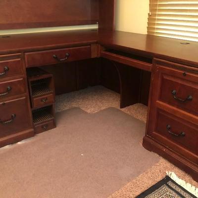 Large L shaped desk with overhead credenza
