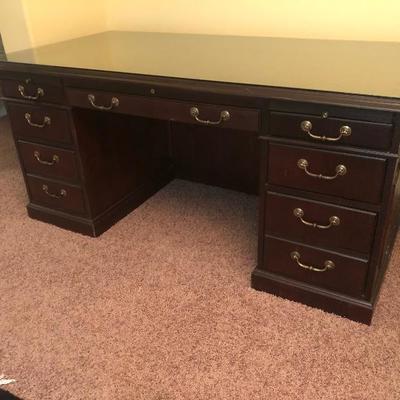 Mahogany desk with glass top