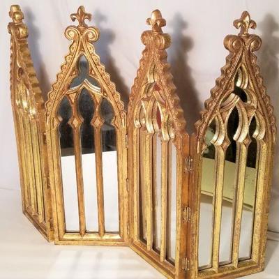 Lot #30  Contemporary hinged mirrored decorative screen with Fleur di Lis styling