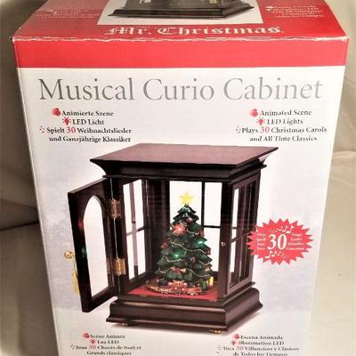 Lot #45  Musical Curio Cabinet - plays 30 songs