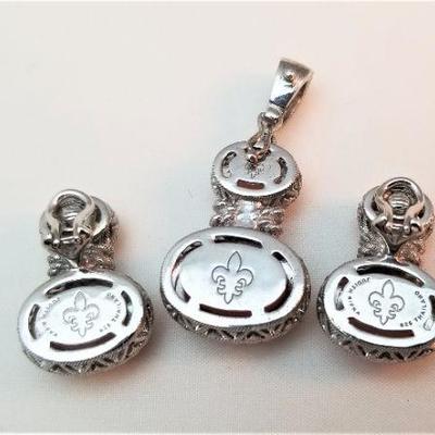 Lot #72  Sterling Silver pendant with matching clip earrings. 