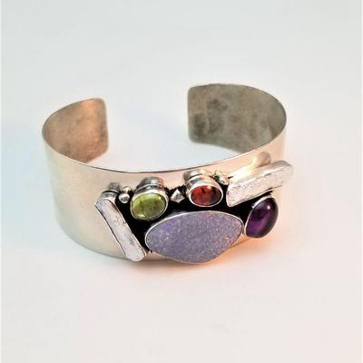 Lot #103  Sterling Silver Cuff Bracelet encrusted with Amethyst, Amber, more
