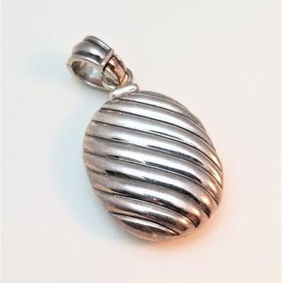 Lot #107  Sterling Silver DAVID YURMAN photo locket with 18kt gold accent