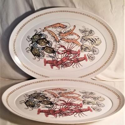 Lot #119  Lot of two Retired New Orleans-themed platters - seafood motif