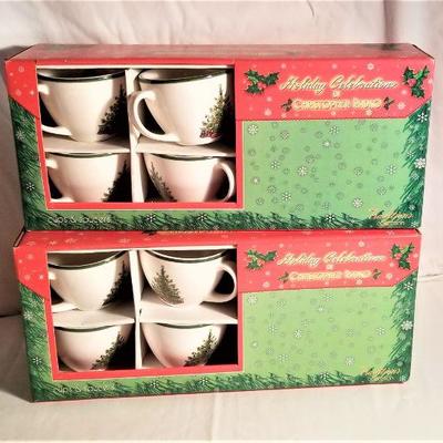 Lot #131  New in box - 2 boxes of Christopher Radko Christmas dinnerware, cups and saucers