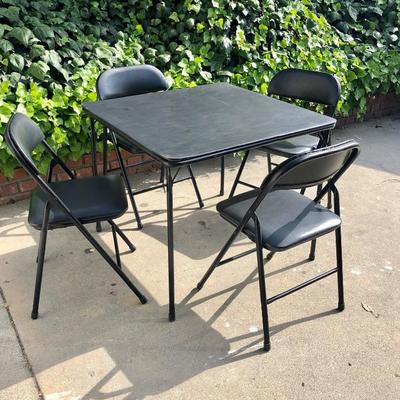 Folding card table and 4 folding chairs.