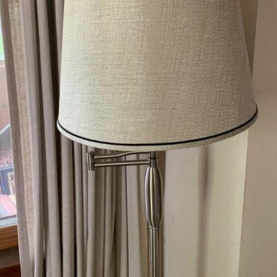 Swing arm chrome floor lamp / modern