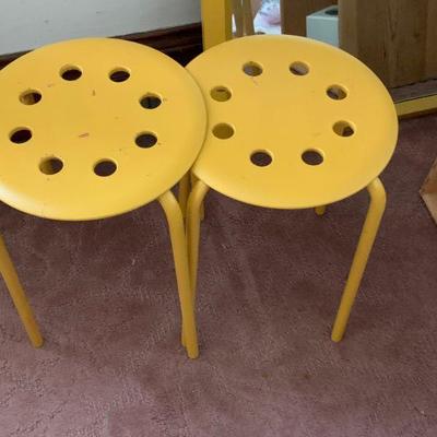 Pair of yellow stools