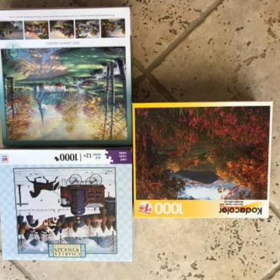 JIGSAW PUZZLE LOT - 2 Hometown 1000 pc puzzles & 1 Great American Puzzle Factory 750 pc