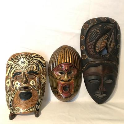 Lot 7 - Ceramic and Carved Masks
