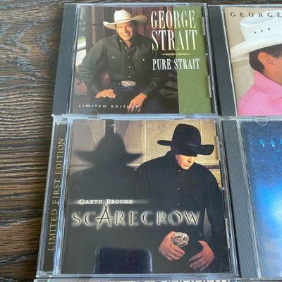 Lot of 3 George Strait CDs and 4 Garth Brooks CDs