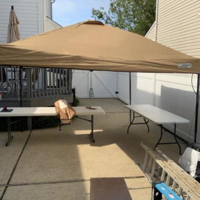 First Up 10ft x 10 ft straight wall Gazebo Lot 2657 | EstateSales.org