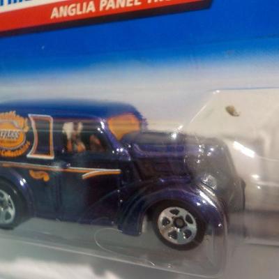 2000 Anglia panel truck hot wheels and # 6 stock car racer.