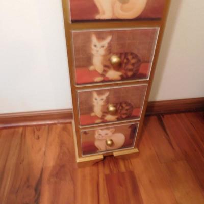 LOT 29 Seven Drawer Chest With Cats On drawer fronts 