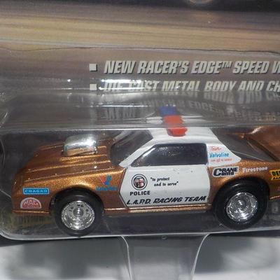 2- COOL cars Metro rail and LAPD race team, Stock police racer/ johnny lighting.1997