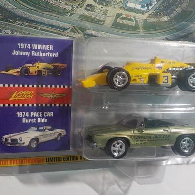 1974 winner Johnny Rutherford dragster and 74 pacer Hurst olds.
