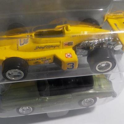 1974 winner Johnny Rutherford dragster and 74 pacer Hurst olds.