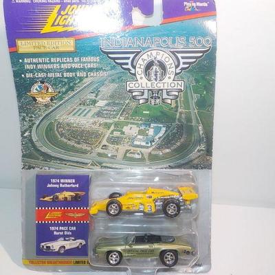1974 winner Johnny Rutherford dragster and 74 pacer Hurst olds.