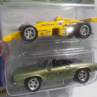 1974 winner Johnny Rutherford dragster and 74 pacer Hurst olds.