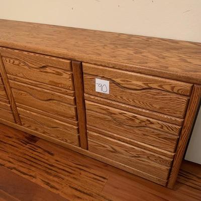 LOT 90. Oak Nine Drawer Dresser 