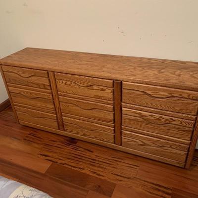 LOT 90. Oak Nine Drawer Dresser 