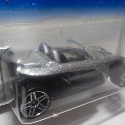 Hot wheels Lotus and Matchbox Ford explorer.